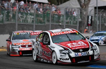 car Garth Tander leads Jamie Whincup in the latter stages of yesterday's race