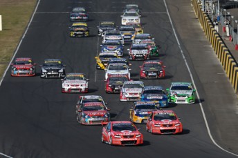 thumb Jamie Whincup leads the field at the start of today's race