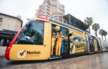 James Moffat and Michael Caruso with the yellow Norton tram