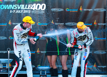Tander and Courtney celebrate on the podium