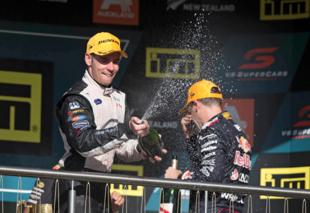 Scott Pye celebrates on the podium