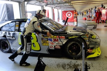 thumb Crew Chief Chad Knaus guides the #48 Lowe's Chevrolet of Jimmie Johnson into the garage area at Texas for extensive repairs after a lap 3 crash