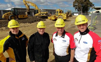 thumb James Moffat, Allan Moffat, Dick Johnson and Steve Johnson stand in front of the construction work at Sandown Raceway