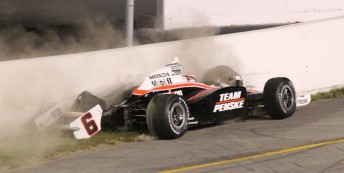 1MCQ7963 Aussie Ryan Briscoe's day ended against the wall