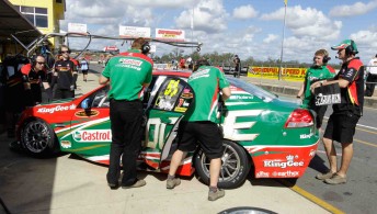 thumb Barkley, far right, with the Castrol EDGE Commodore VE at Queensland Raceway