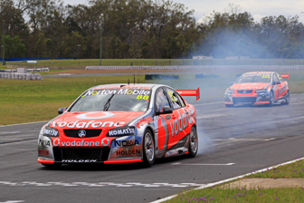 thumb Sebastien Bourdais smokes the tyres in a practice start at Queensland Raceway today