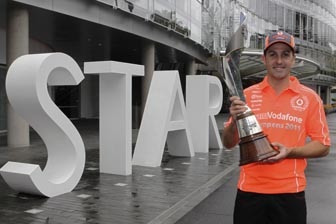 thumb Jamie Whincup with his V8 championship trophy