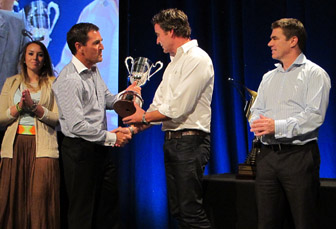 thumb Porsche motorsport manager Jamey Blaikie presents the trophy to Craig Baird