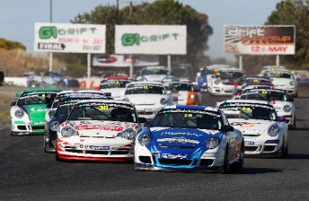 thumb Modystach heads the field into Turn 1