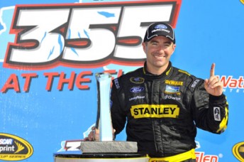 2012 NASCAR Sprint Cup Series,Watkins Glen Marcos Ambrose celebrates on the Watkins Glen podium