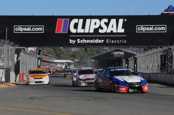 Ash Walsh leads into Turn 1.