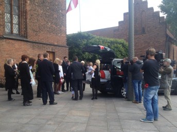 Allan Simonsen's casket is placed in the hearse following the service. Pic: Paul Ryan
