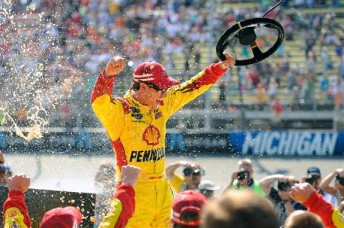 Joey Logano celebrates at Michigan