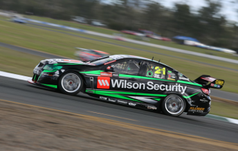 Pither at the wheel of the #21 Holden at Queensland Raceway