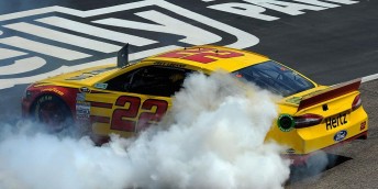 Joey Logano celebrates in Texas