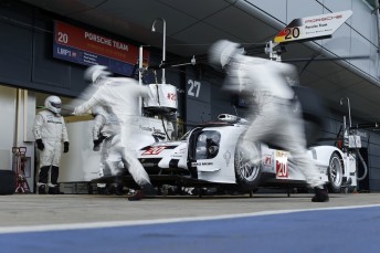 Porsche #20 being serviced on its way to a Silverstone podium