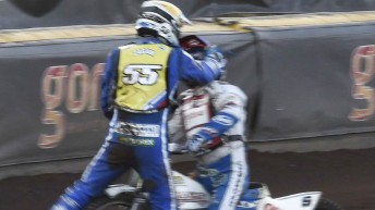 Matej Zagar (#55) approaches Nicki Pedersen after the Dane fenced him