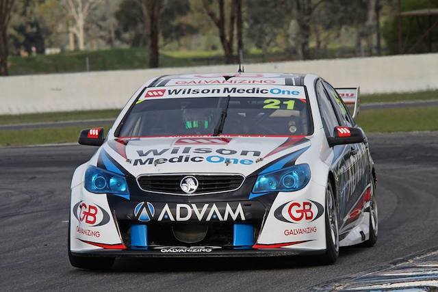 Pither at the wheel of the #21 Commodore in June