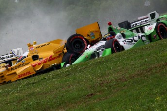 Sebastien Bourdais had a lucky escape after Ryan Hunter-Reay's machine slammed into the the Frenchman