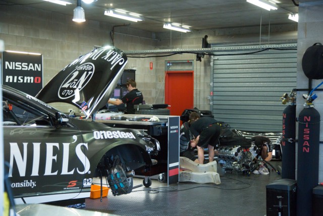 The Nissan team installing Kelly's upgraded engine on Thursday
