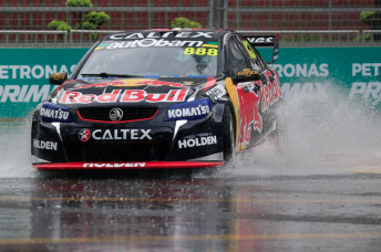 Lowndes' early laps were run in heavily wet conditions