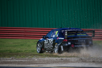 Andre Heimgartner runs off track at Turn 1 during Friday practice