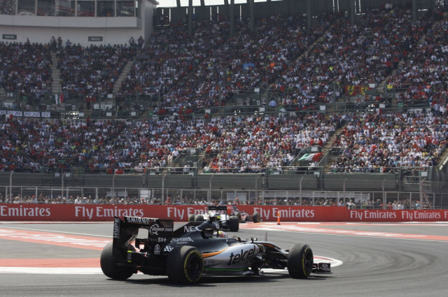 Local hero Sergio Perez enters the stadium section of his home Grand Prix in Mexico City