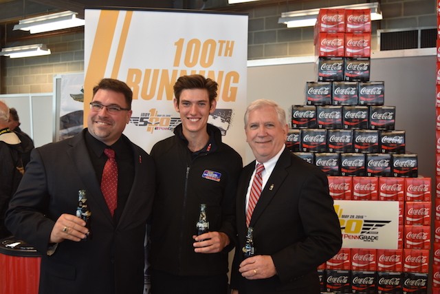 Matt Brabham flanked by Coca-Cola's Todd Marty (left) and Roy Potts